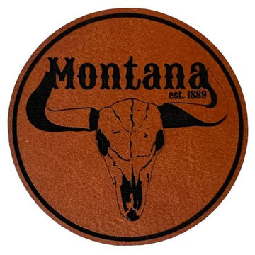 A rawhide-inspired round patch featuring a Montana steer silhouette, perfect for showcasing Montana's rugged spirit.