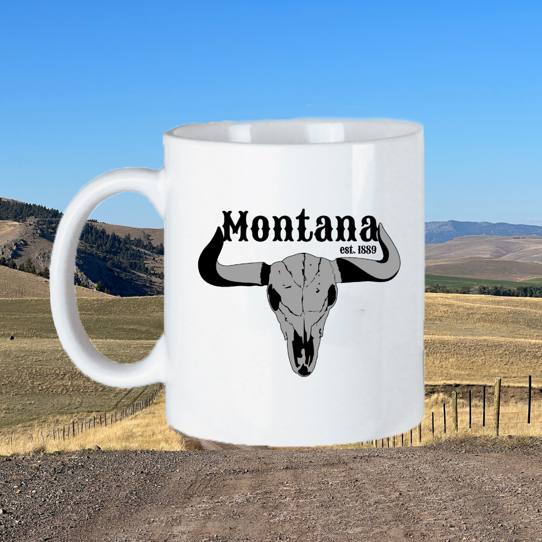 Image of the 11oz Montana Steer Mug, featuring the silhouette of a steer against a rustic background, perfect for those who appreciate the heritage and culture of the American West to enjoy their drink with a touch of Montana flair.