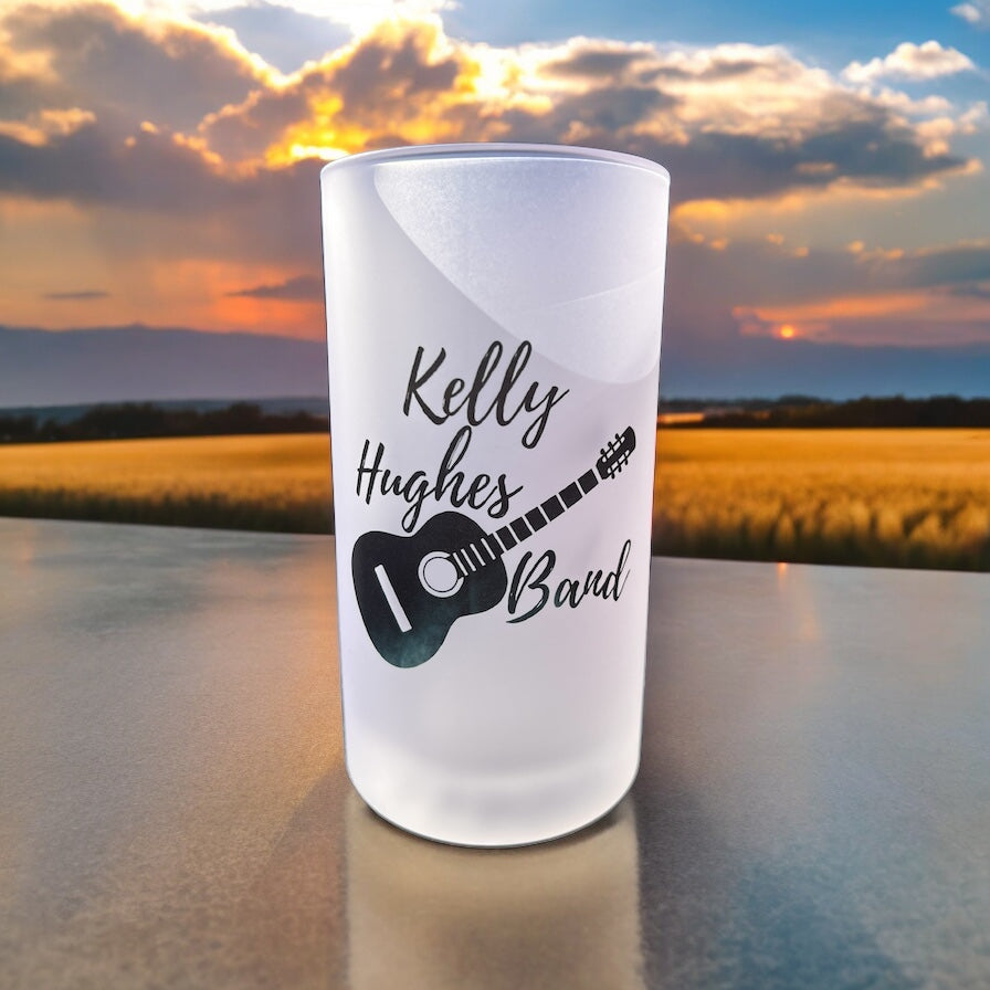 Image of the Kelly Hughes Band Frosted Beer Mug, featuring the band's logo on frosted glass, perfect for enjoying your favorite brew with style.