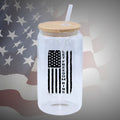  Image of the Let Freedom Ring Glass Beer Can available in frosted or clear options, featuring a bamboo lid and straw for enjoying beverages in patriotic style with added convenience.
