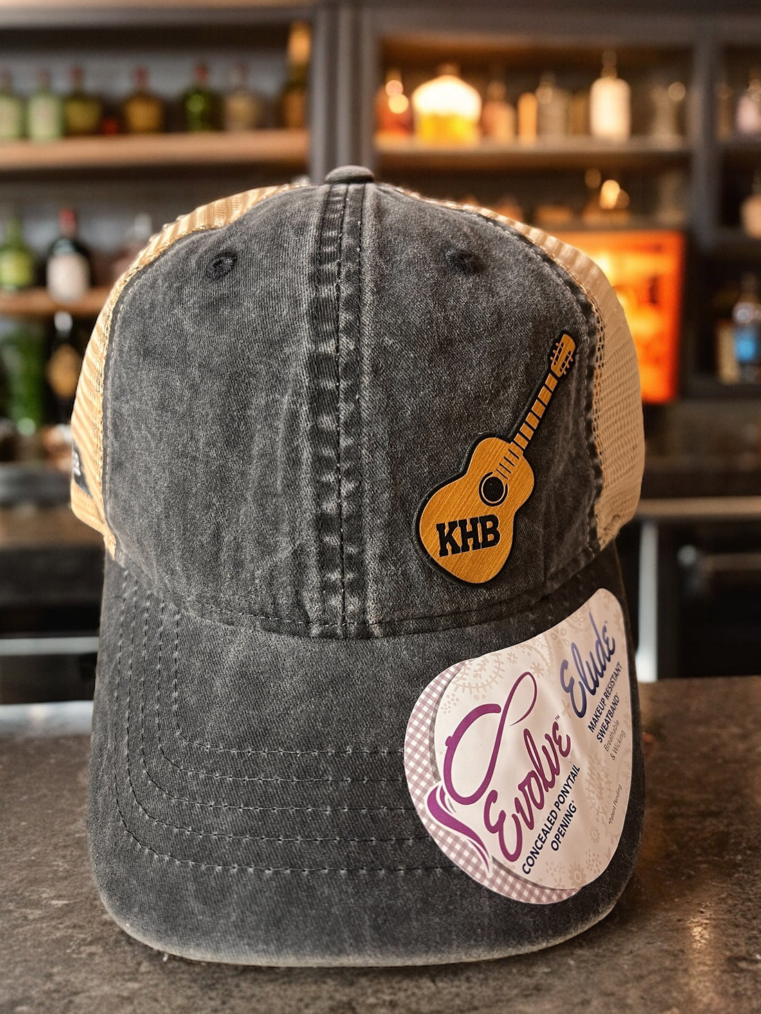 Image of the Kelly Hughes Band Wild Rhythm Cap, featuring the band's logo embroidered on the front, perfect for unleashing your inner rockstar with edgy style and comfort.