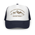 Outlaw Gear Mind Your Own Mountain foam trucker hat with white front panel, navy mesh back, and mountain graphic.