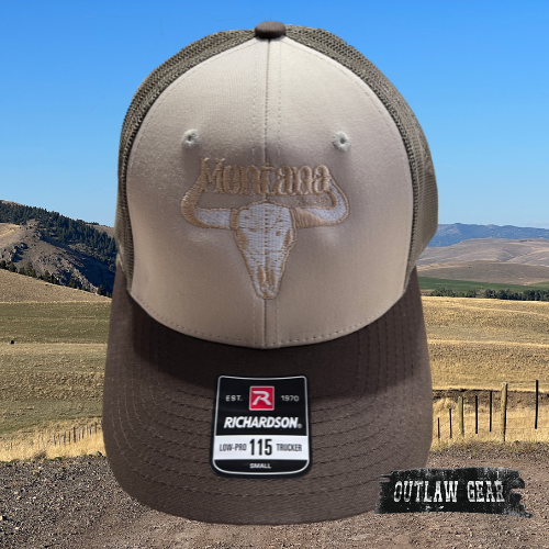 A Richardson Low Pro Trucker Hat in tan, loden, and brown, featuring an embroidered Montana steer silhouette.