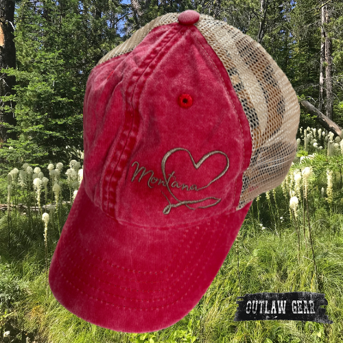 An embroidered red and leopard print ponytail hat adorned with "Montana Love," a stylish accessory for expressing state pride.